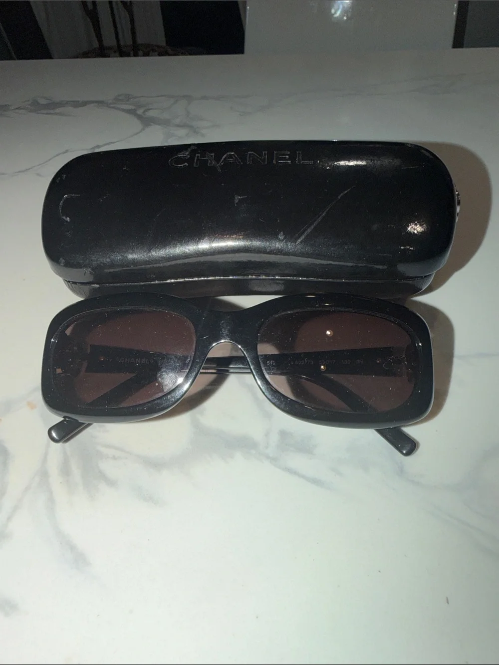 CHANEL Black Sunglasses with Brown Lenses